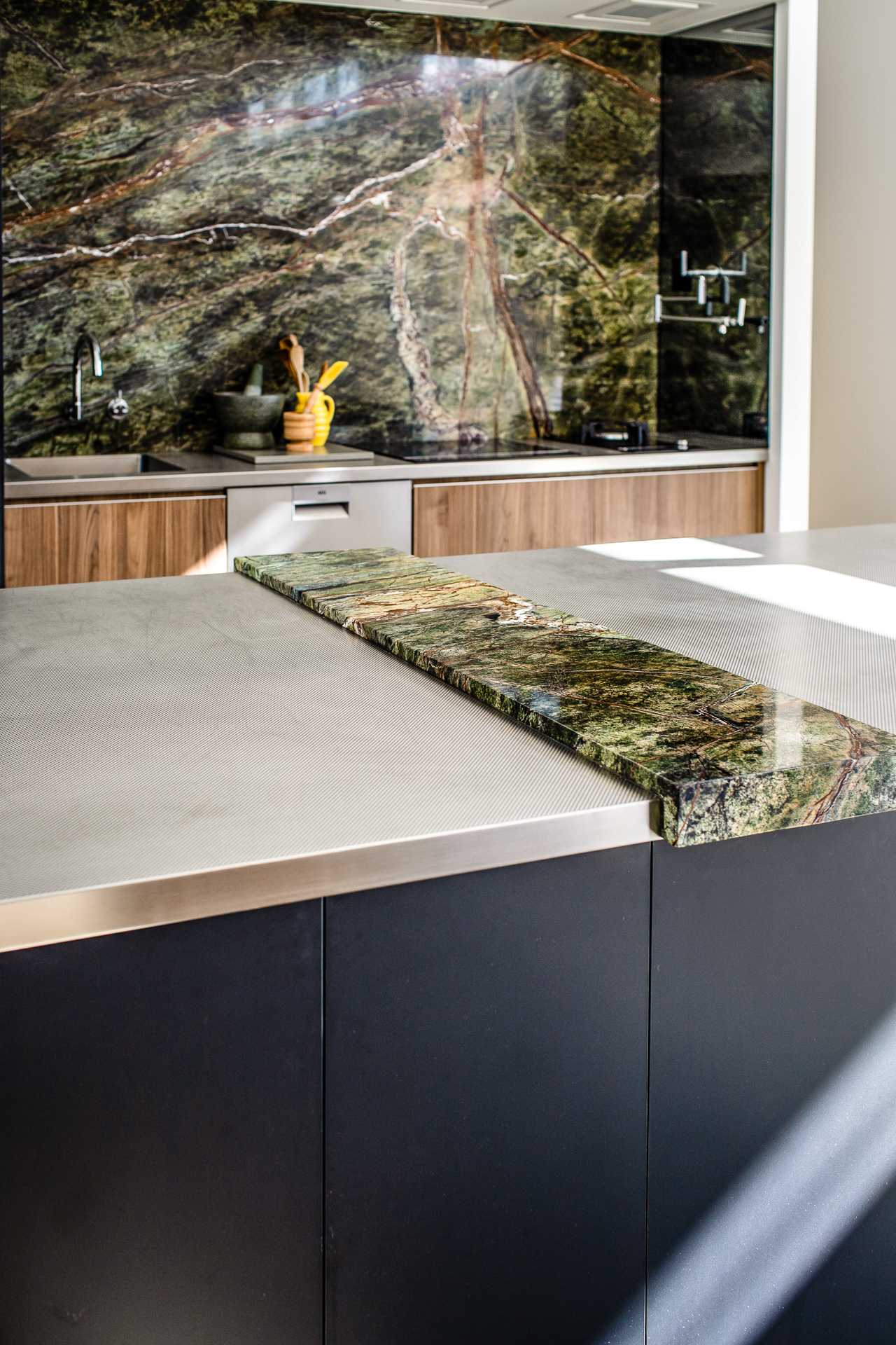 Stone bathroom vanity and splashback